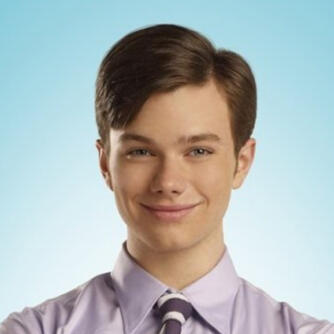 an image of bobby nash from 9-1-1 with a lesbian flag overlay